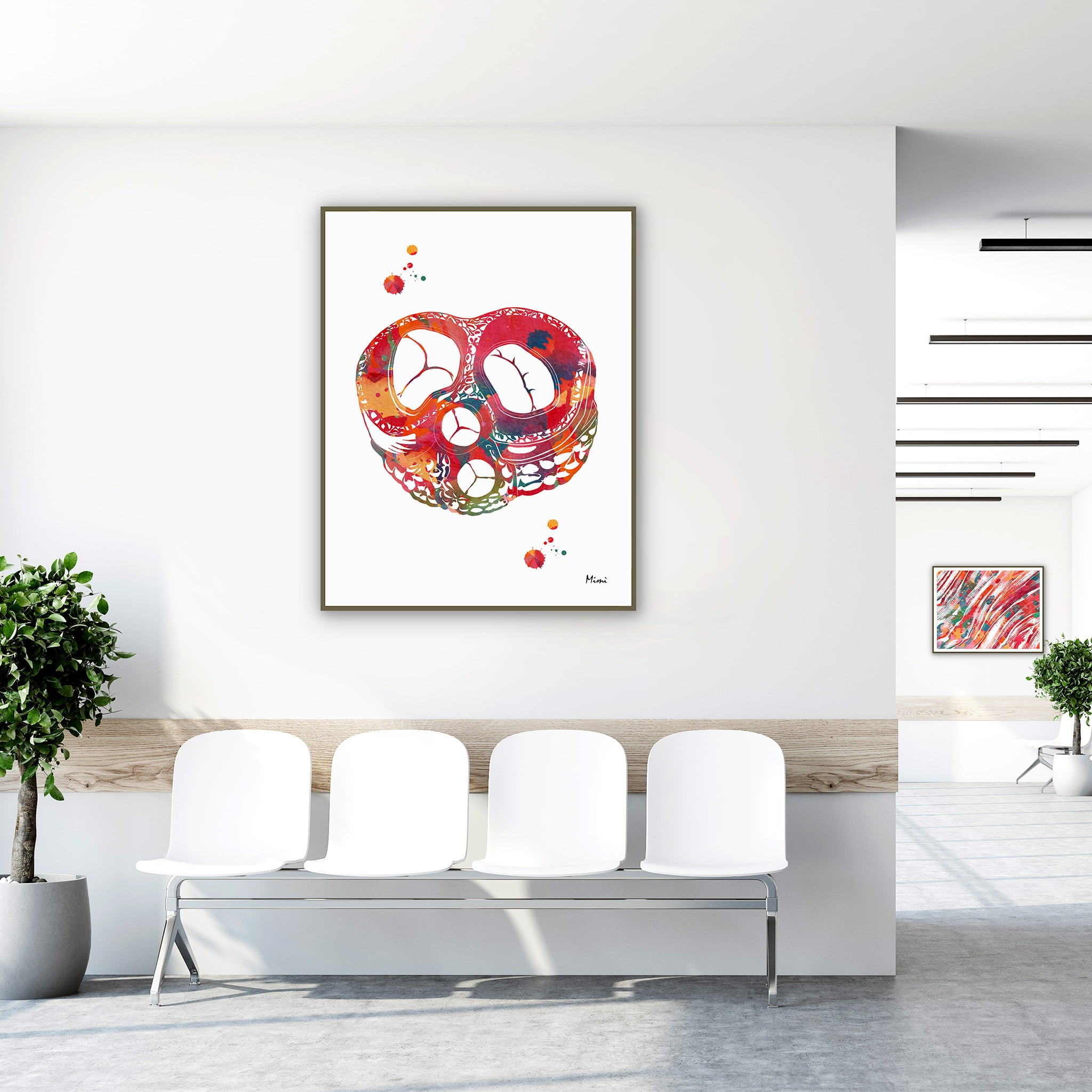 Framed heart valves watercolor print in a clinic waiting room
