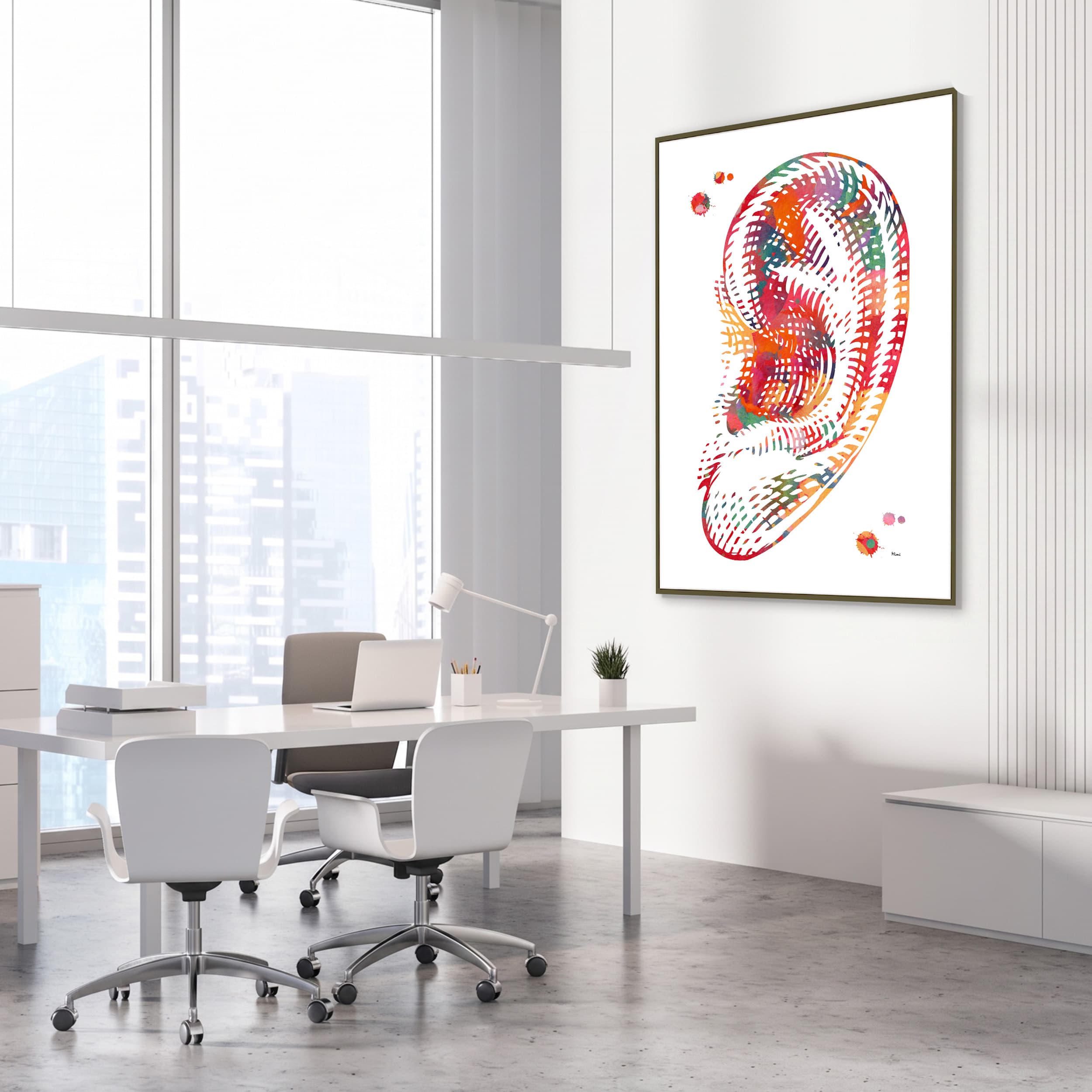 Framed human ear anatomy watercolor print in an ENT clinic