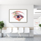 Framed human eye front view watercolor print in a clinic waiting room