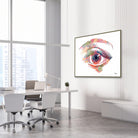 Framed human eye front view watercolor print in an ophthalmology clinic
