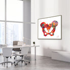 Framed human pelvis anatomy watercolor print in an orthopedic clinic