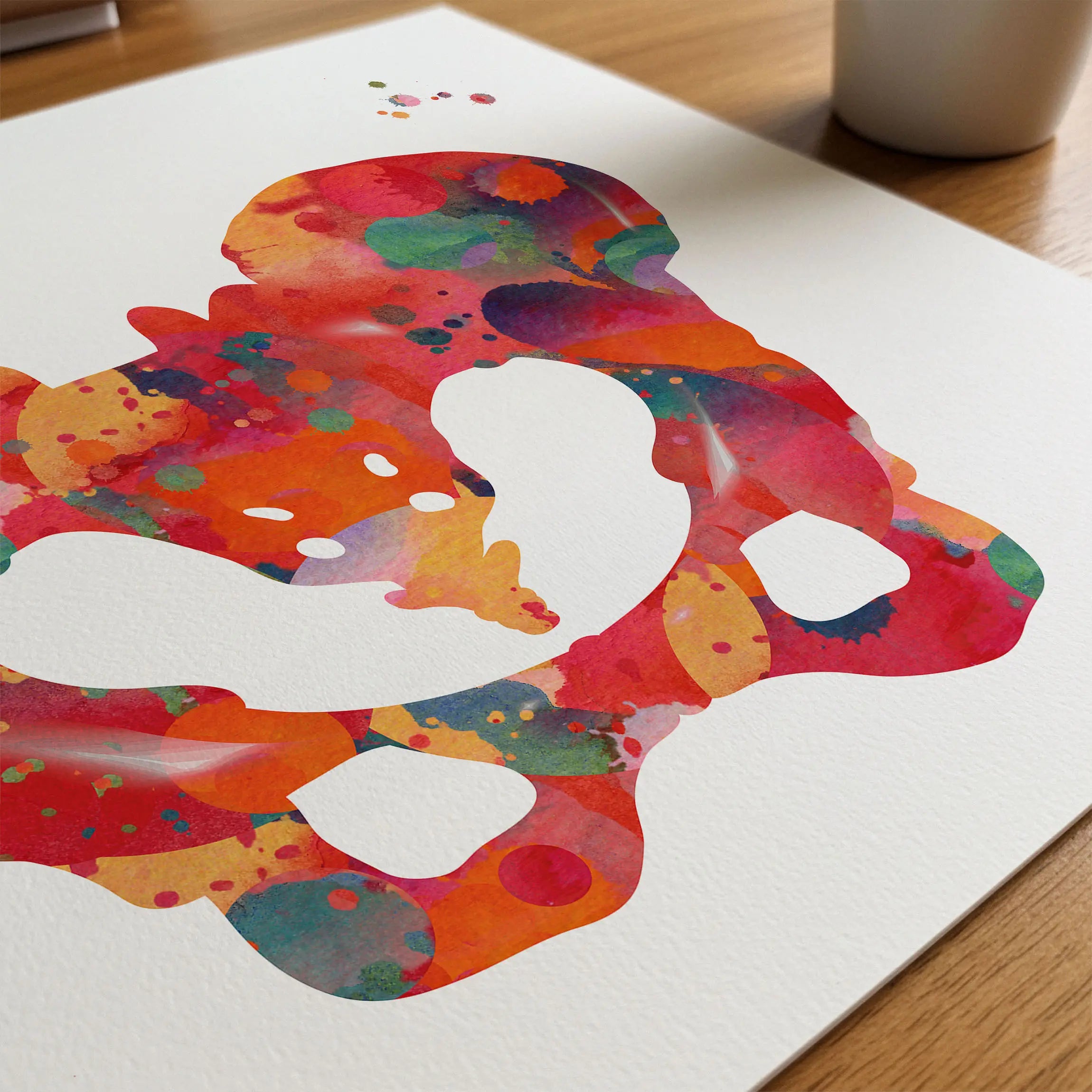 Close-up of human pelvis anatomy watercolor print showing paper texture and grain