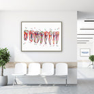 Framed human teeth anatomy watercolor print in a clinic waiting room