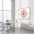Framed iris anatomy watercolor print in an ophthalmology clinic