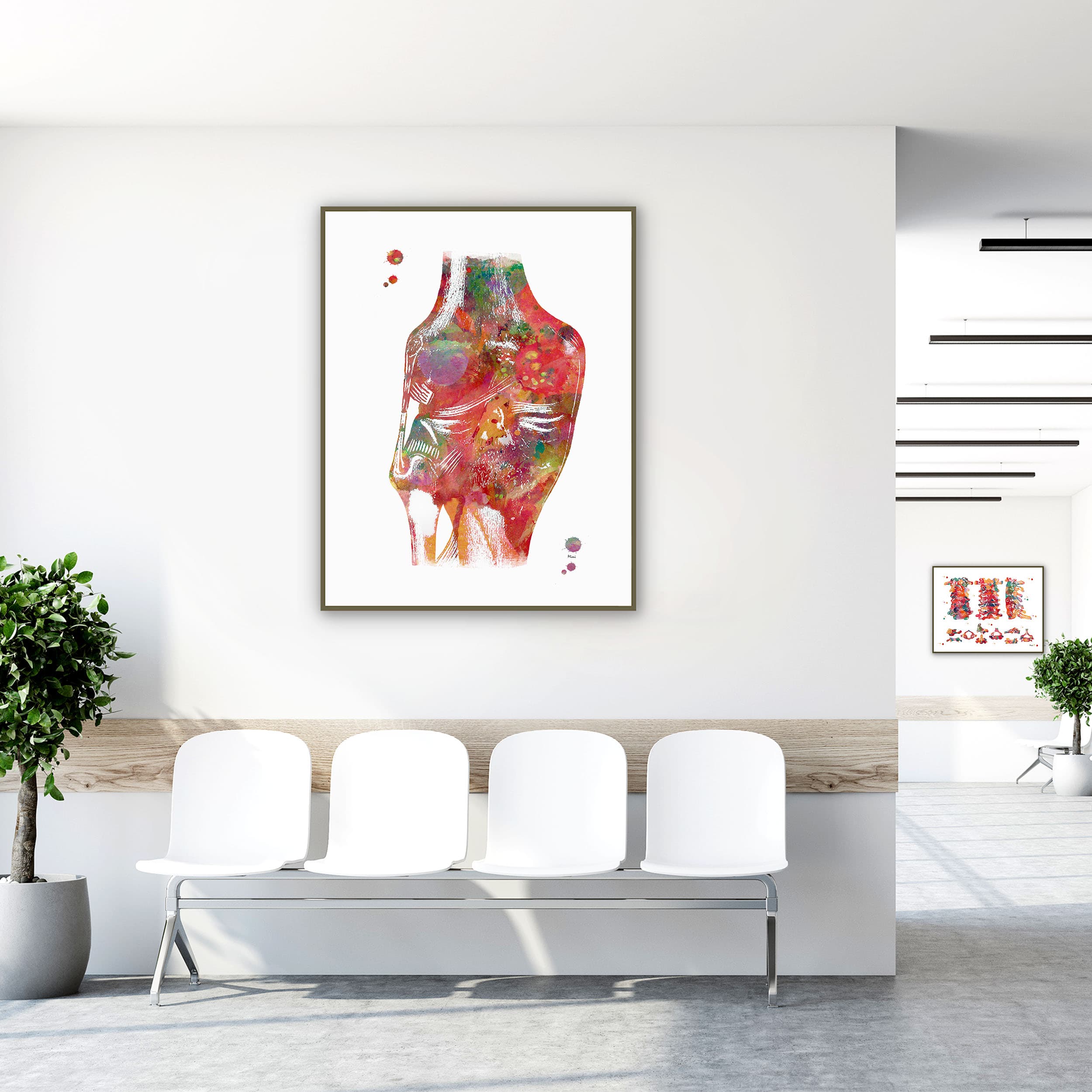 Framed knee ligaments watercolor print in a clinic waiting room