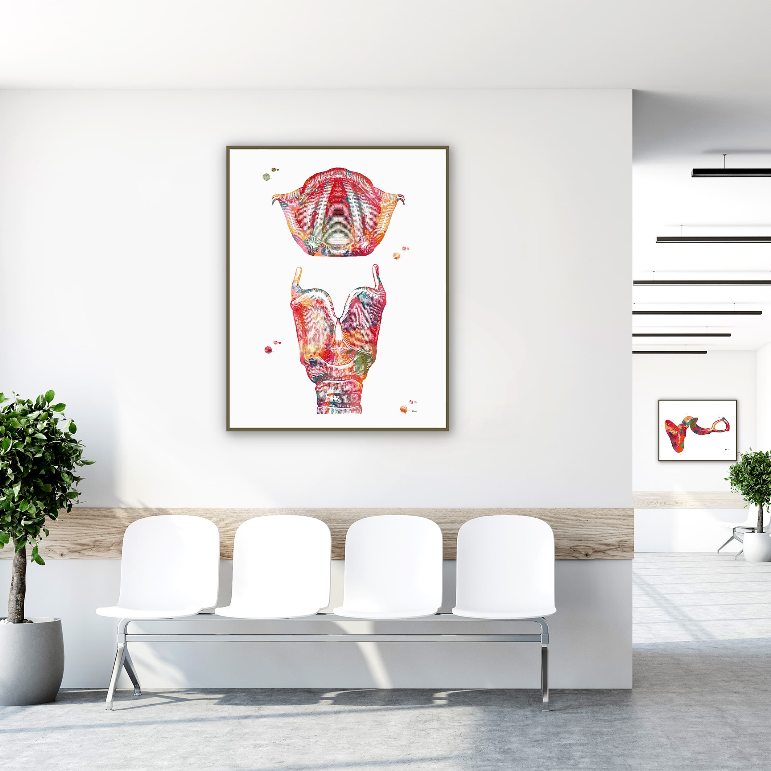 Framed larynx watercolor print in a clinic waiting room
