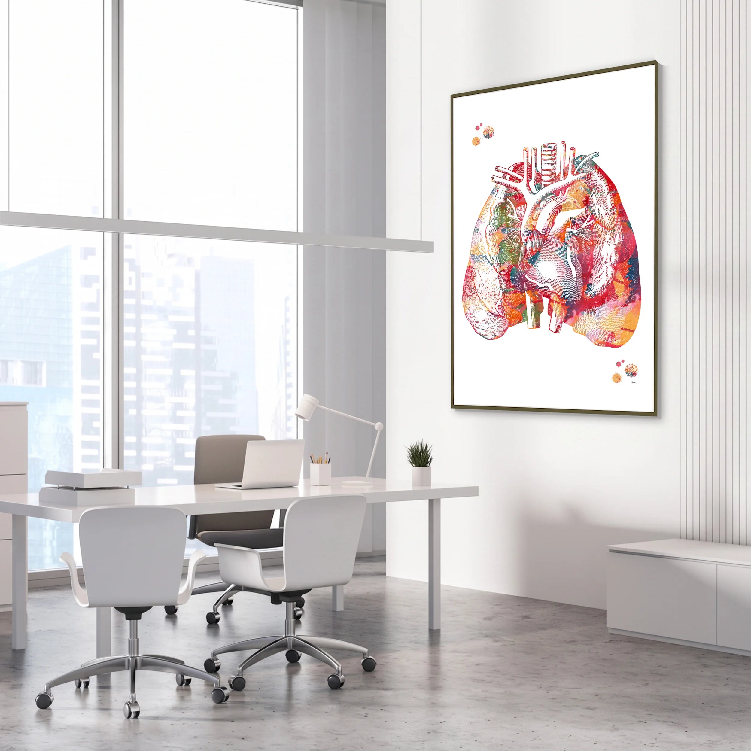 Framed lungs and heart anatomy watercolor print in a cardiology clinic