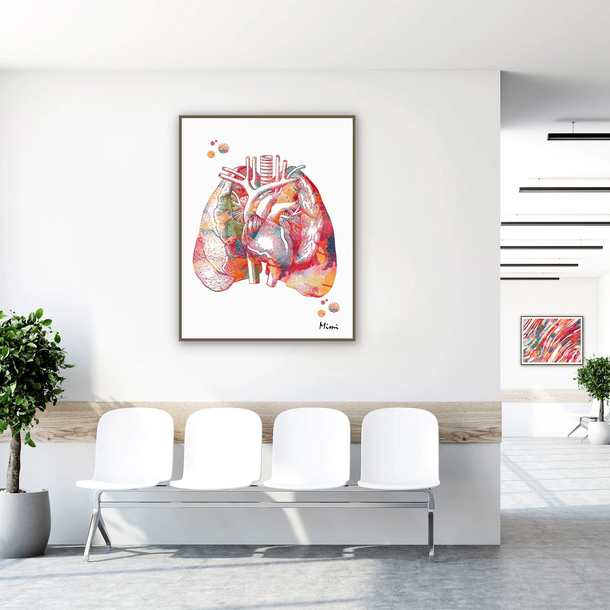 Framed lungs and heart anatomy watercolor print in a clinic waiting room
