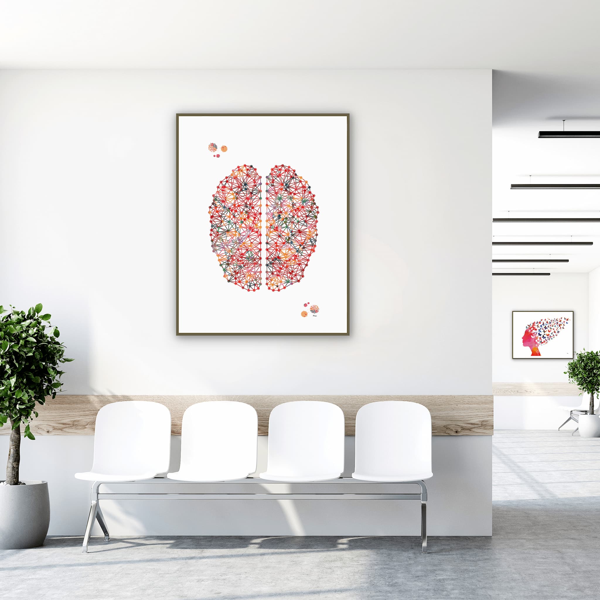 Framed minimalist abstract brain watercolor print in a clinic waiting room