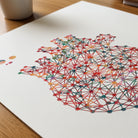 Close-up of minimalist geometric anatomical heart watercolor print showing paper texture and grain