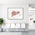 Framed minimalist liver watercolor print in a clinic waiting room