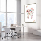 Framed minimalist molar watercolor print in a dental clinic office