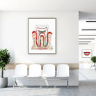 Framed molar cross-section watercolor print in a clinic waiting room