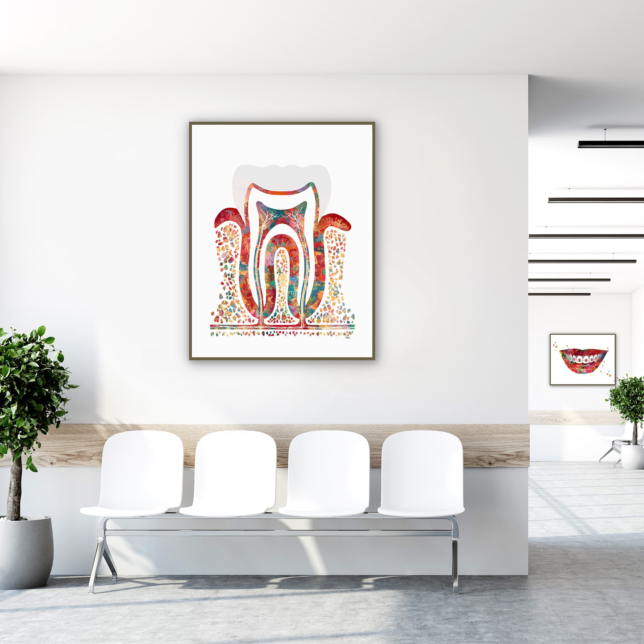 Framed molar cross-section watercolor print in a clinic waiting room