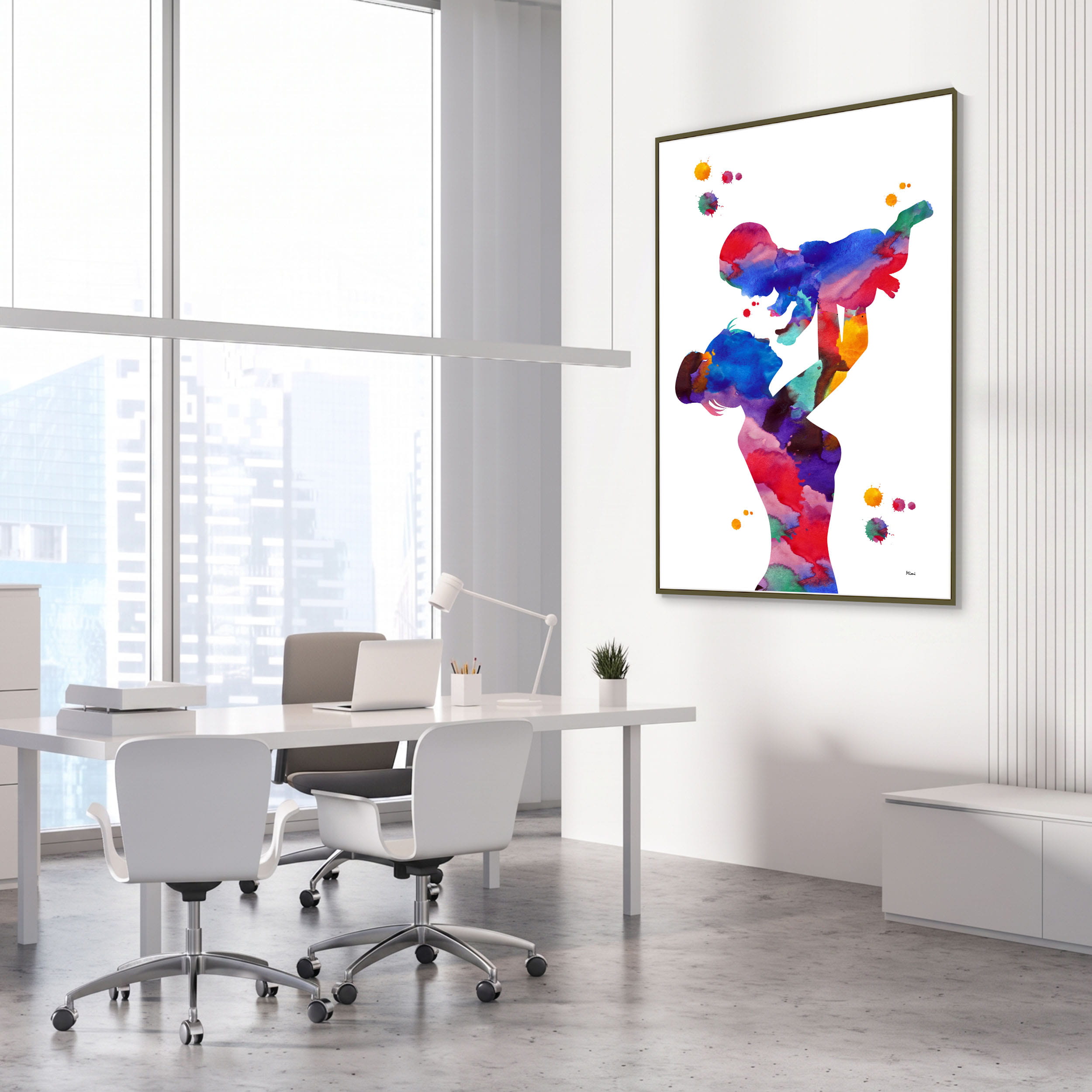 Framed mother holding her child watercolor print in an OB-GYN clinic