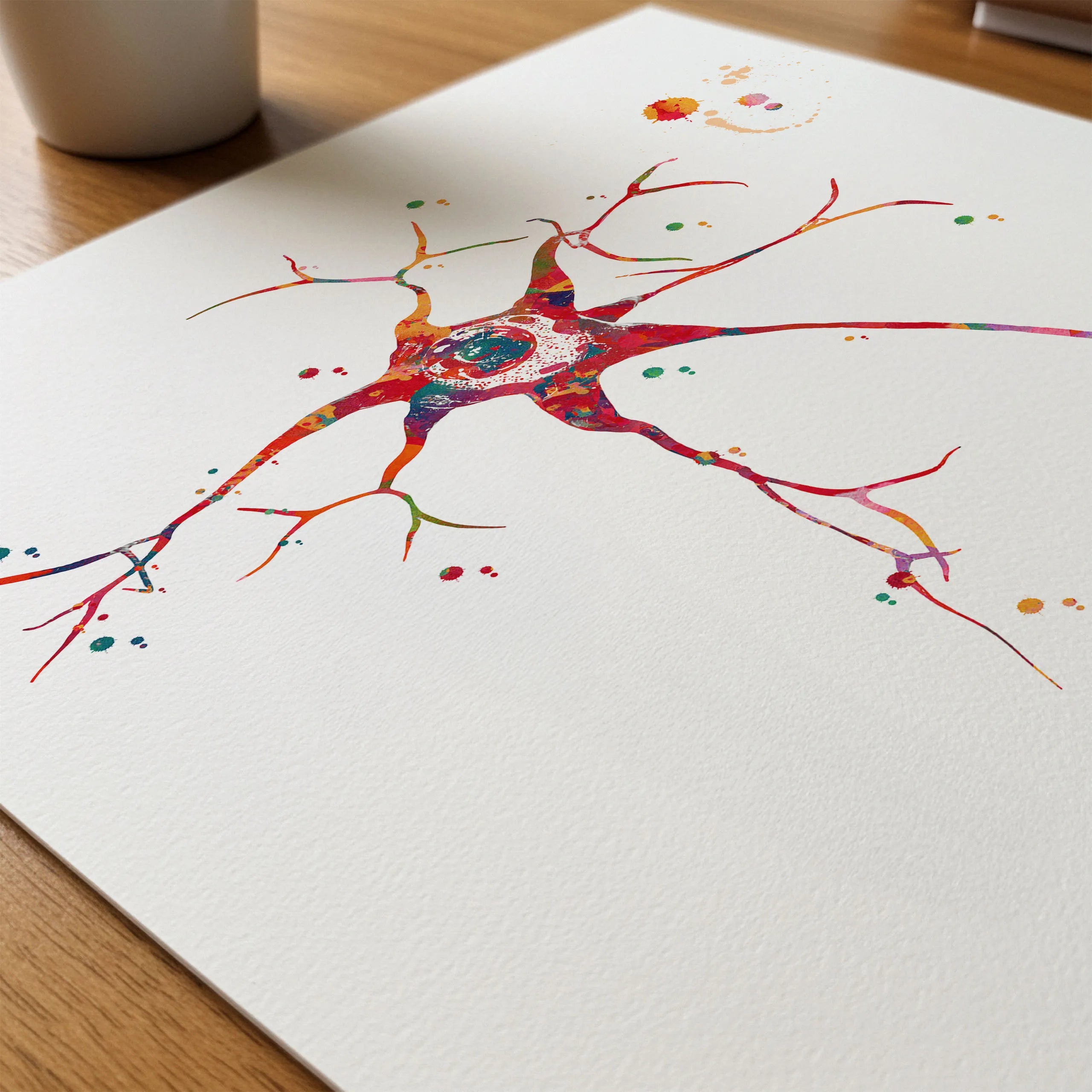 Close-up of multipolar neuron watercolor print showing paper texture and grain