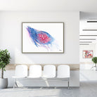 Framed ovary & fimbriae watercolor print in a clinic waiting room