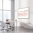 Framed pregnancy phases of fetal development watercolor print in an OB-GYN clinic