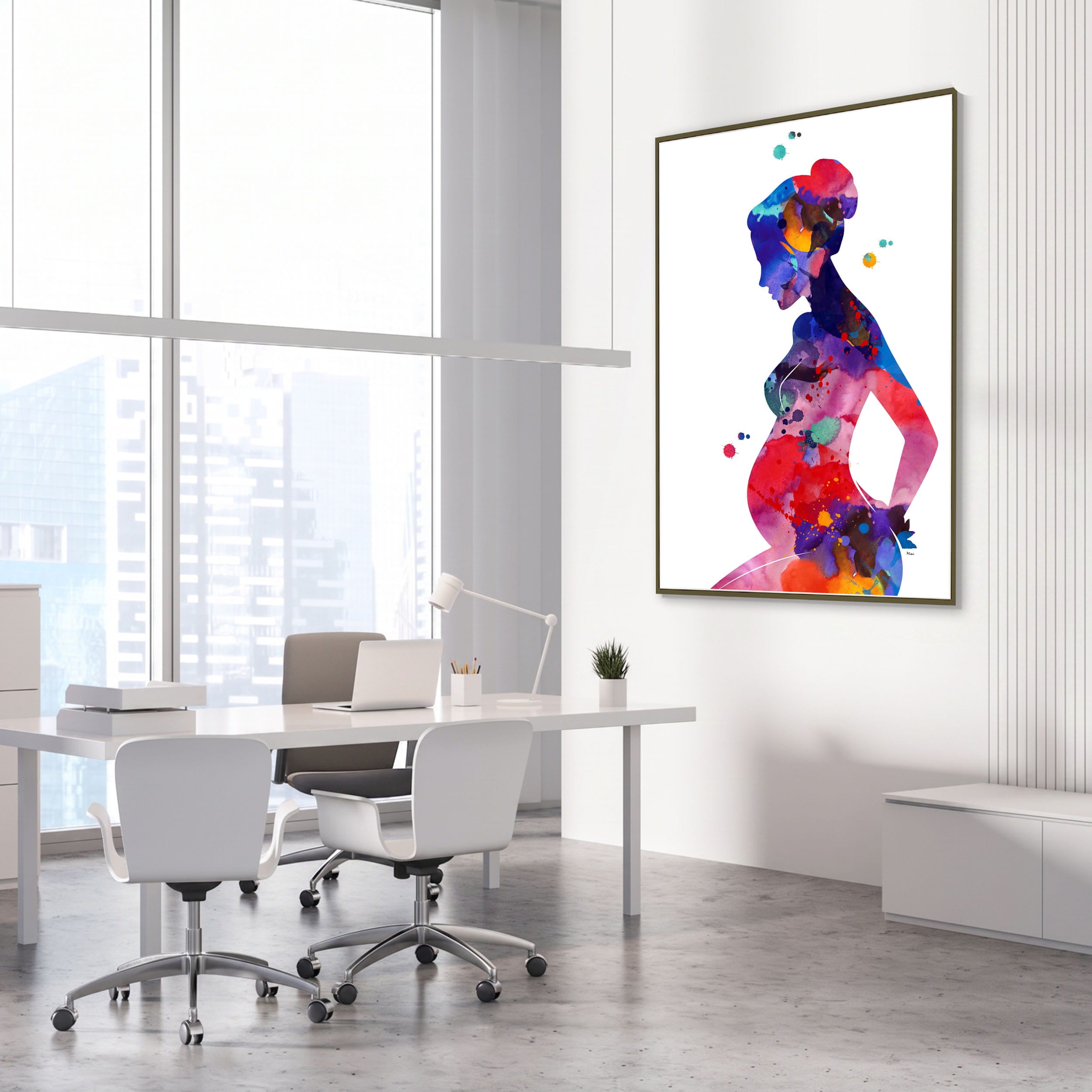 Framed pregnant woman motherhood watercolor print in an OB-GYN clinic