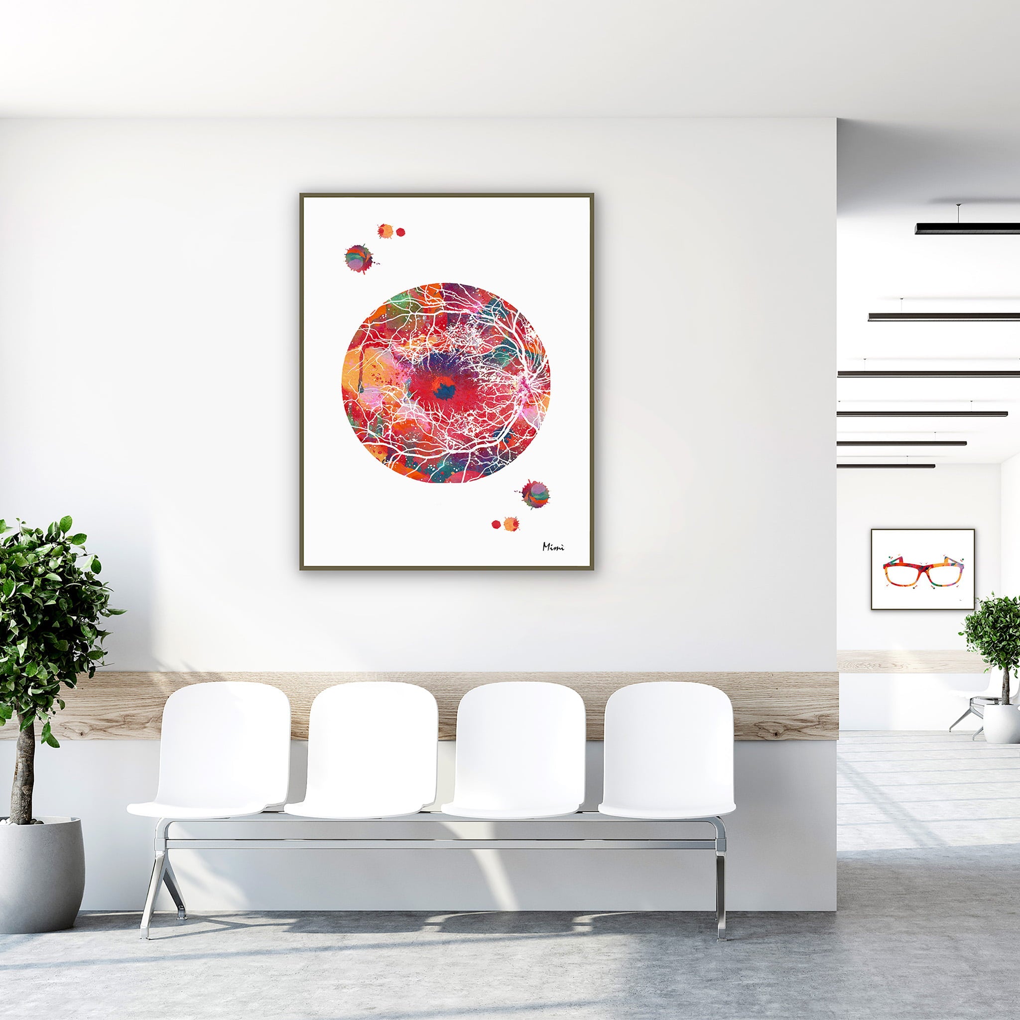 Framed retina & optic disc watercolor print in a clinic waiting room