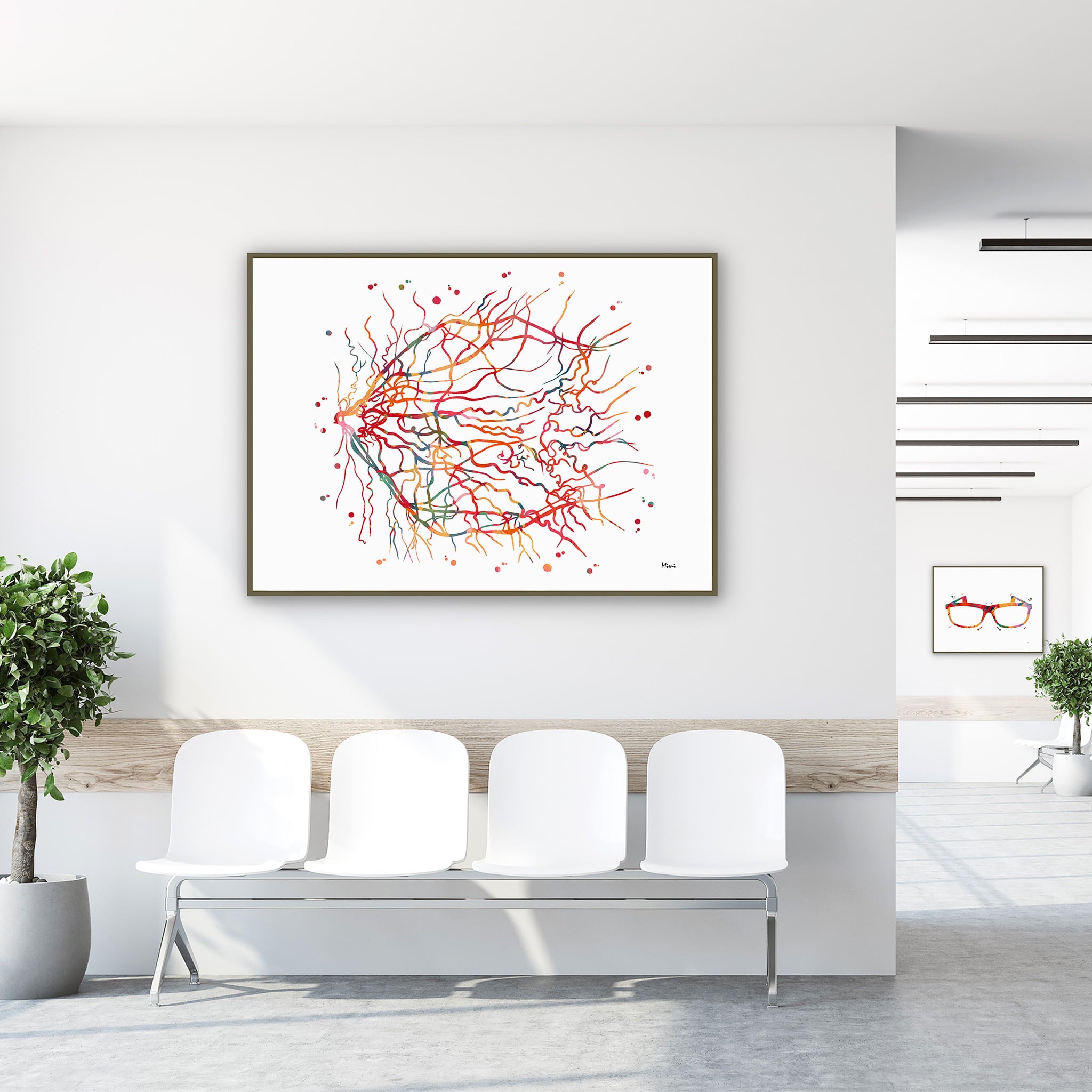 Framed retinal angiogram watercolor print in a clinic waiting room