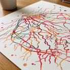 Close-up of retinal angiogram watercolor print showing paper texture and grain