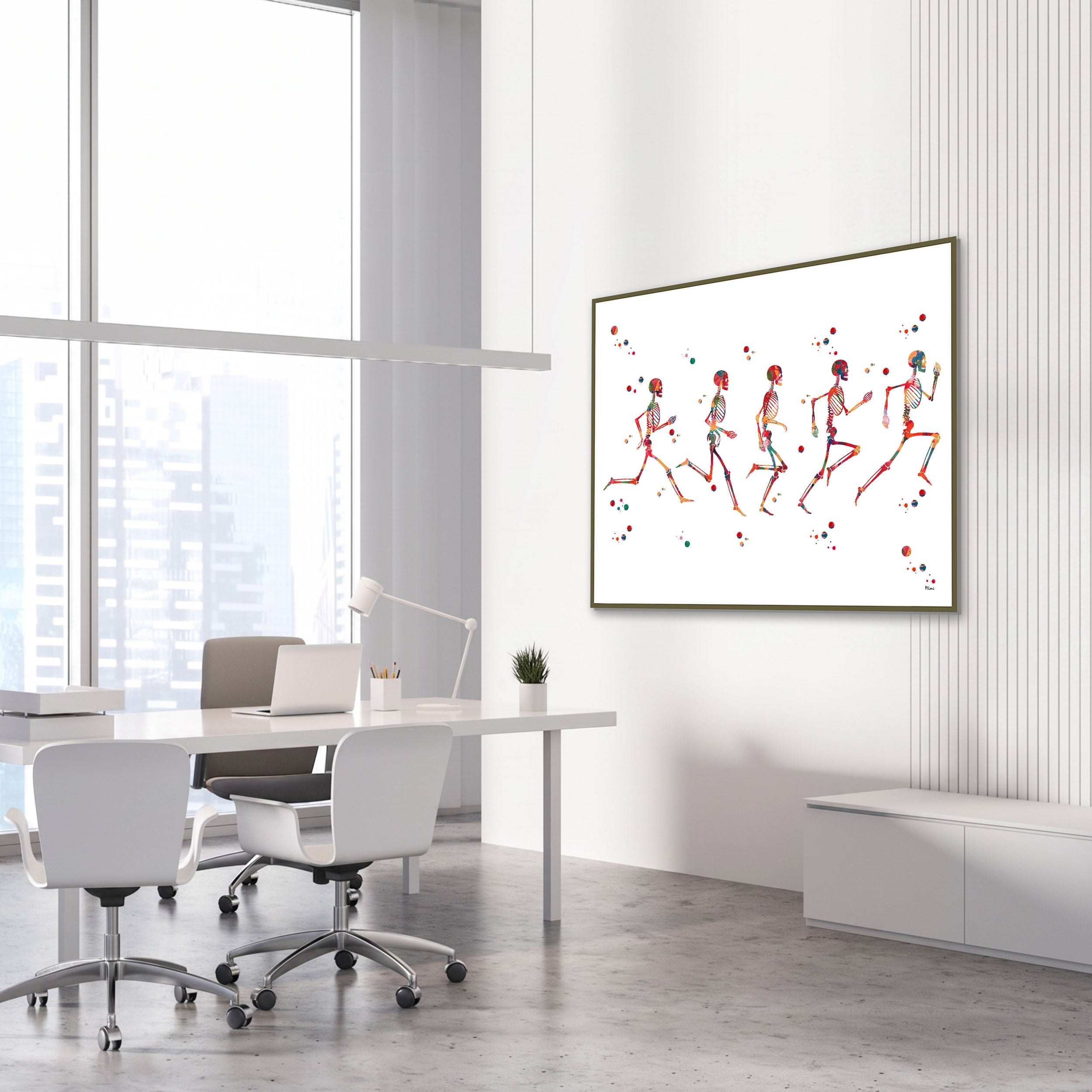 Framed running phases anatomy watercolor print in an orthopedic clinic