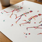 Close-up of running phases anatomy watercolor print showing paper texture and grain