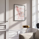 Framed sentinel lymph node watercolor print in a living room