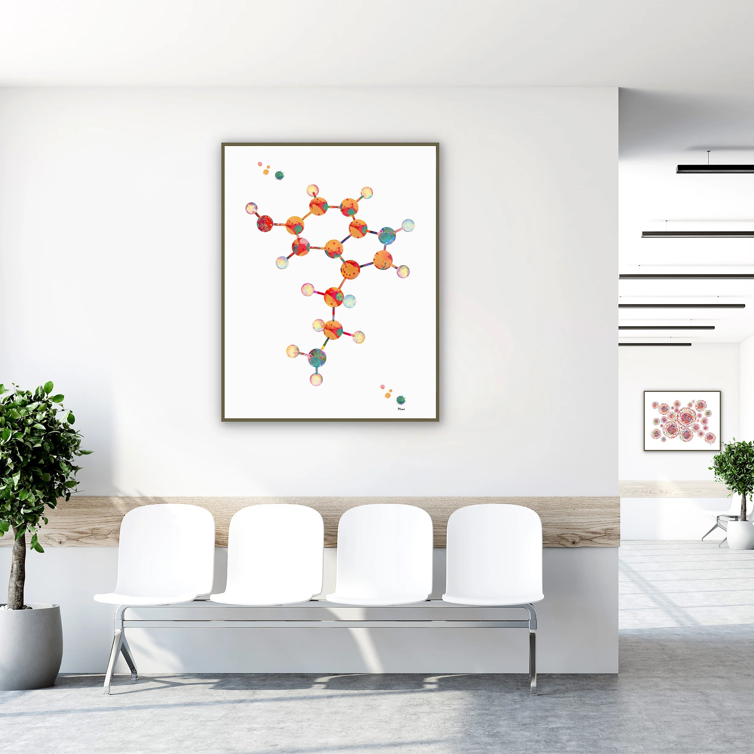 Framed serotonin molecular structure watercolor print in a clinic waiting room