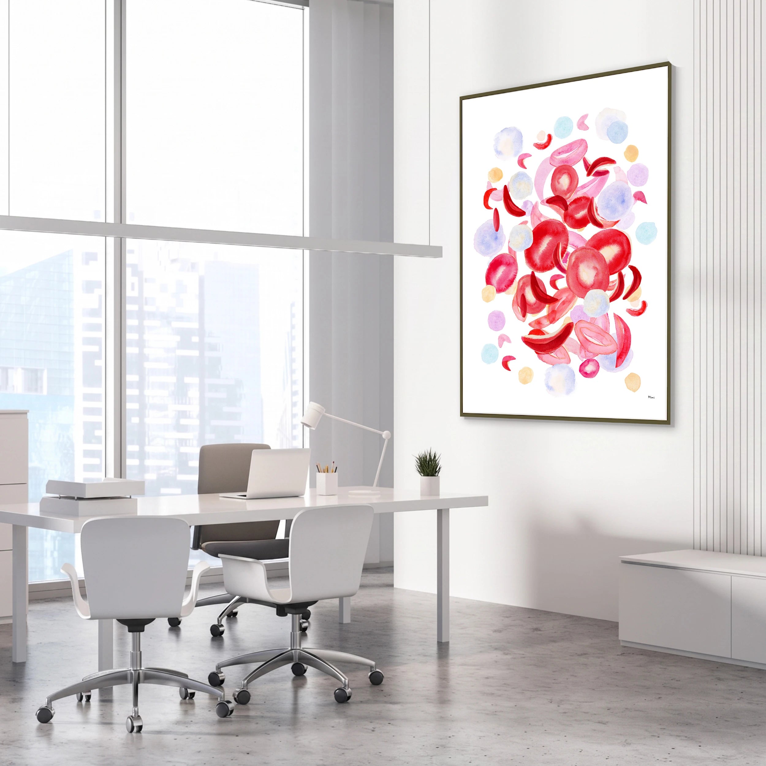 Framed sickle cell anemia watercolor print in a science laboratory office