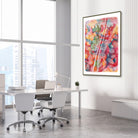 Framed skin anatomy watercolor print in a dermatology clinic