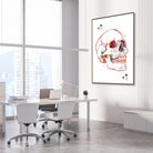 Framed skull anatomy watercolor print in an orthopedic clinic