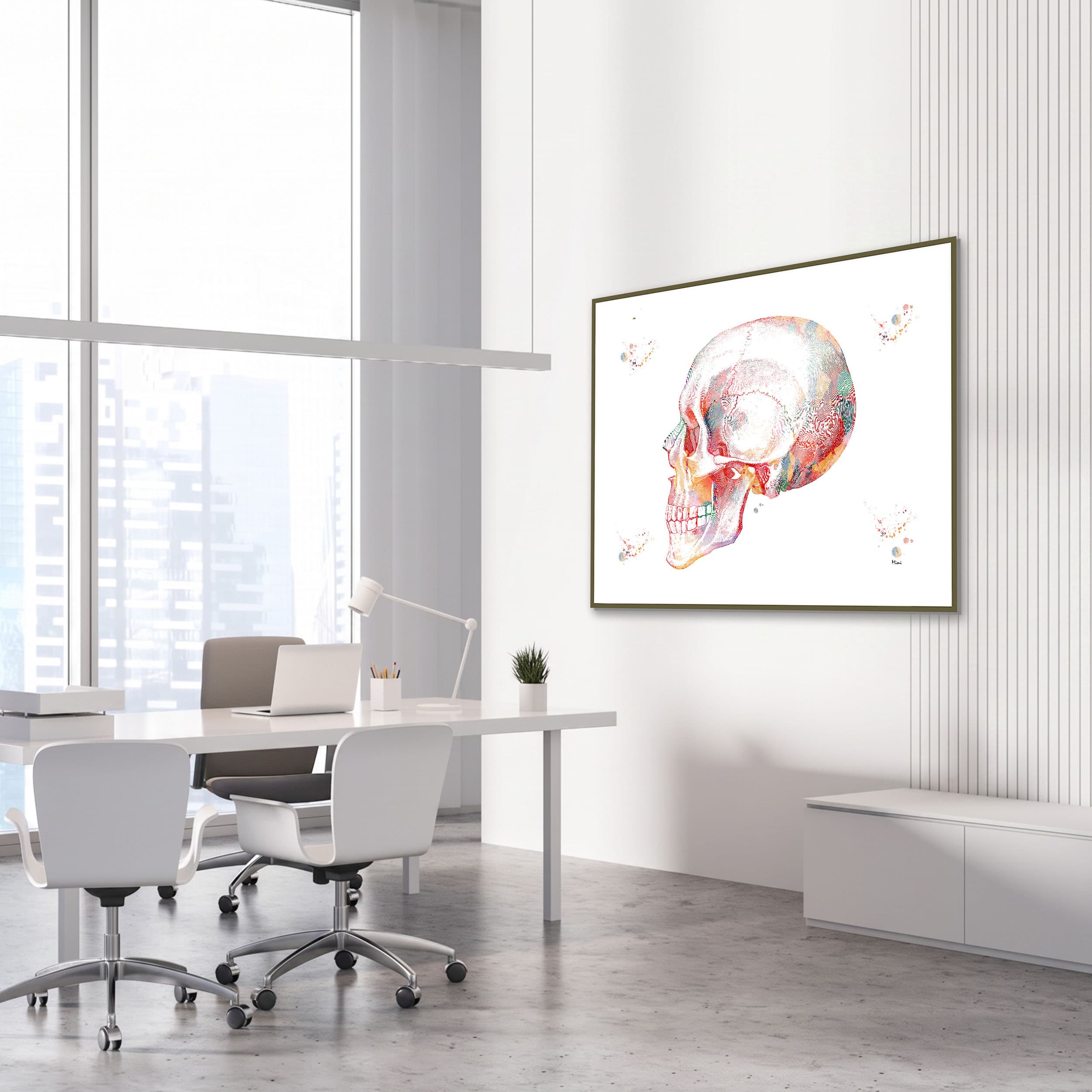 Framed skull lateral view watercolor print in a clinic waiting room