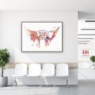 Framed sphenoid bone anatomy watercolor print in a clinic waiting room