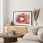 Framed temporal artery histology watercolor print in a warm living room