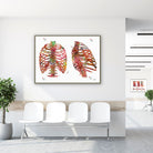 Framed thorax & rib cage watercolor print in a clinic waiting room