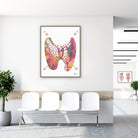 Framed thyroid gland anatomy watercolor print in a clinic waiting room