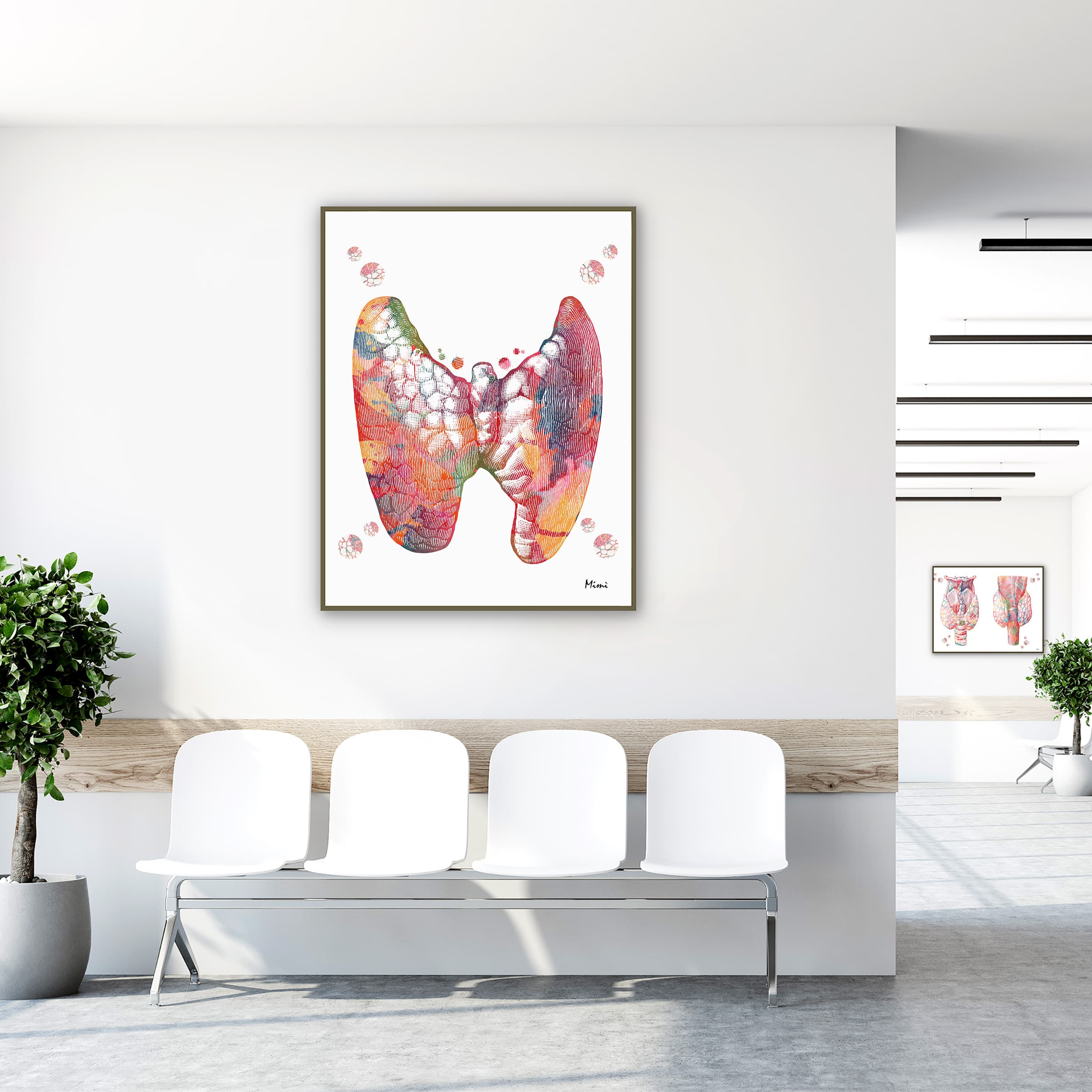 Framed thyroid gland anatomy watercolor print in a clinic waiting room