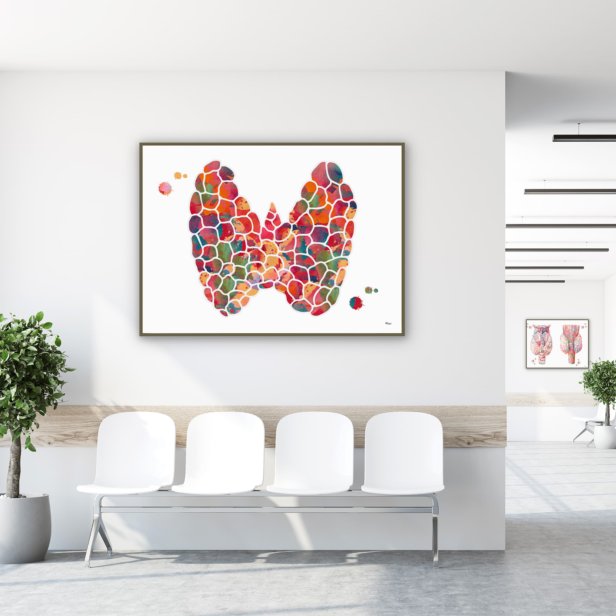 Framed thyroid structure watercolor print in a clinic waiting room