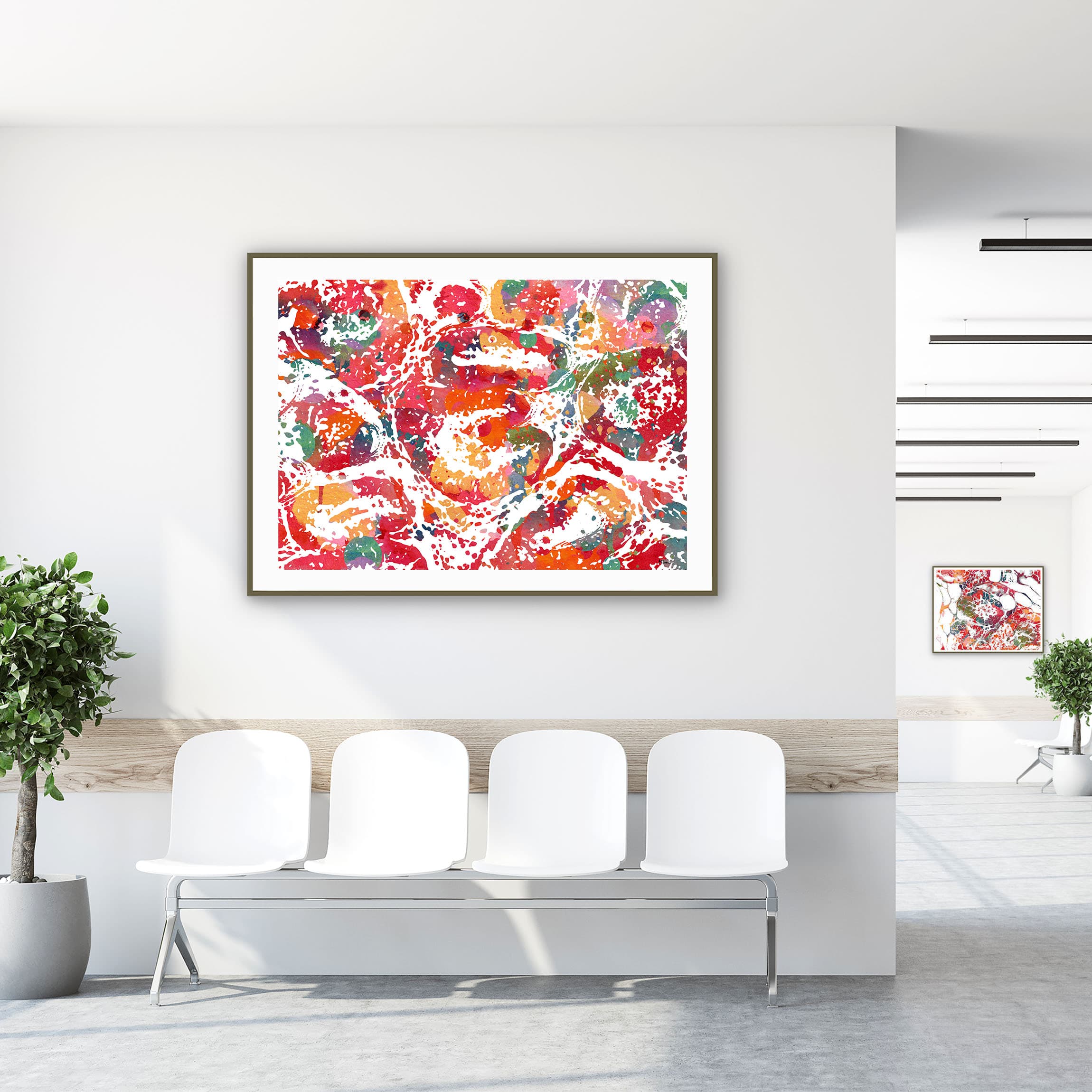 Framed uterus & endometrium watercolor print in a clinic waiting room