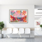 Framed uterus tissue histology watercolor print in a clinic waiting room