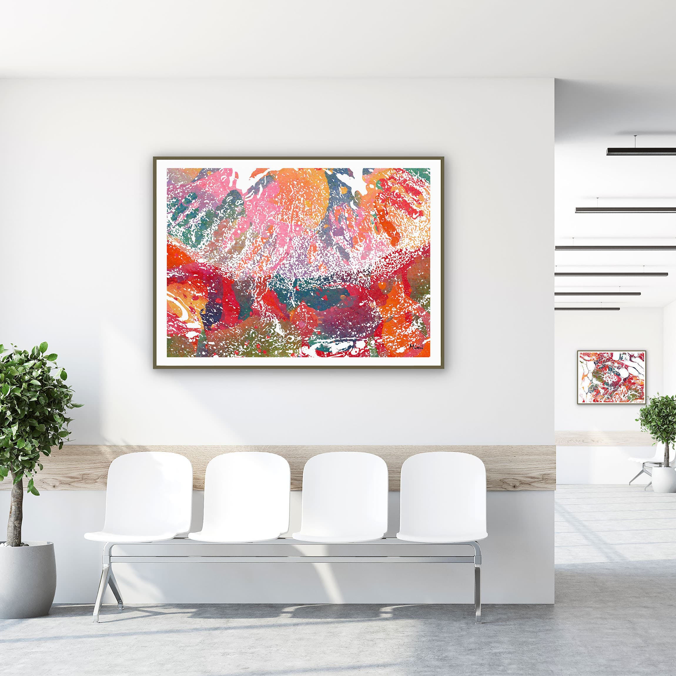 Framed uterus tissue histology watercolor print in a clinic waiting room