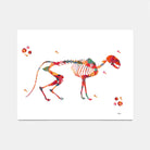 A colorful watercolor-style art print showing the cat anatomy on a white background, photographed against a light gray studio backdrop.